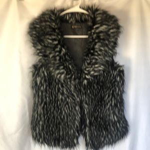 GRASS COLLECTION faux black and white fur vest. Size Medium to Large.